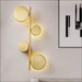 Quad lit Rotating Gold Wall Lamp - Decorative Piece